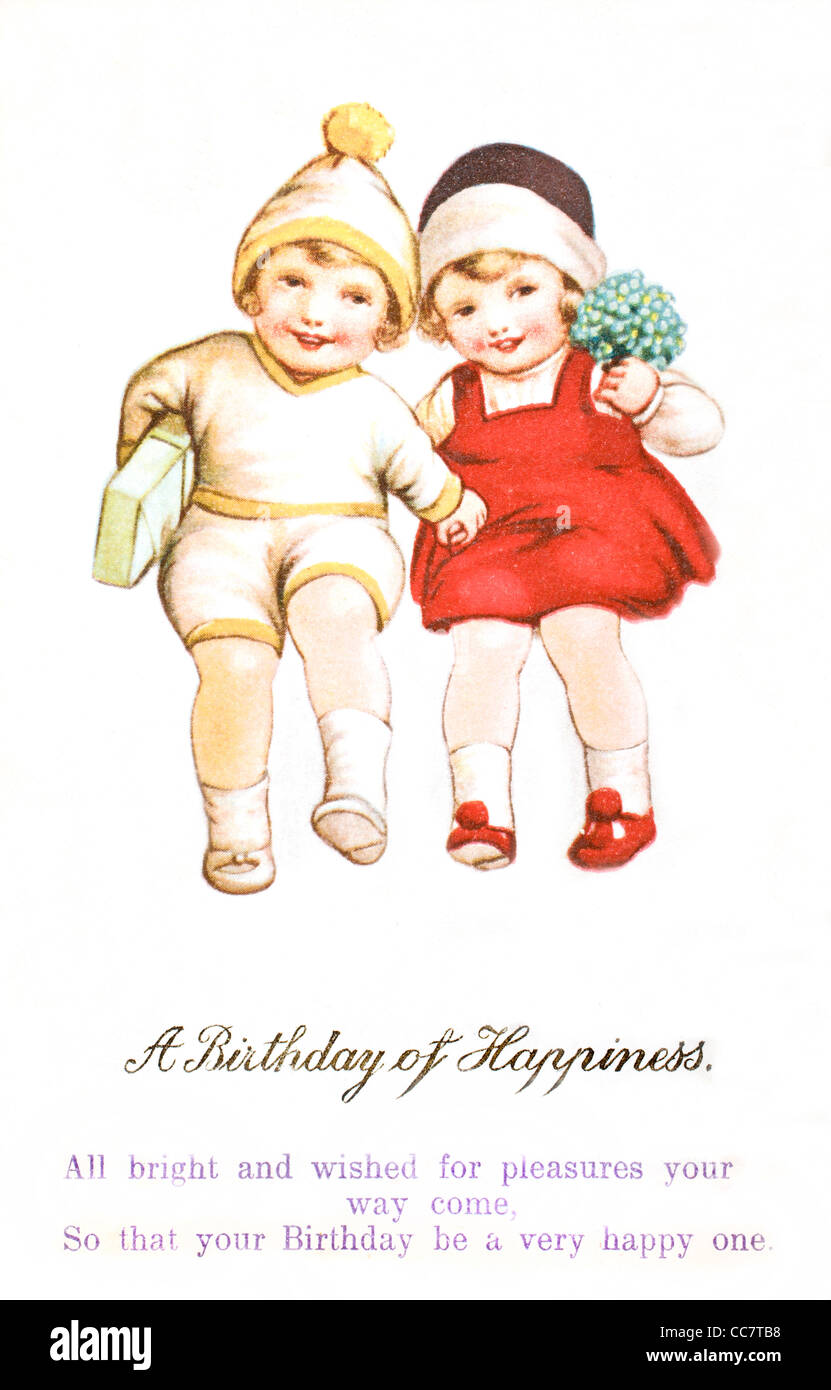 1920's Birthday card in the form of a postcard. Picture of two small girls with printed message. Stock Photo