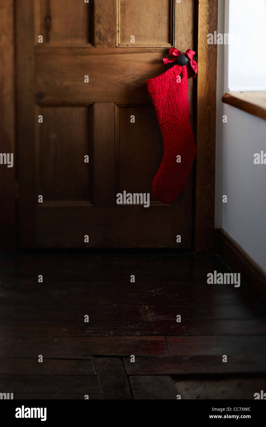 Christmas Stocking Hanging on Doorknob Stock Photo