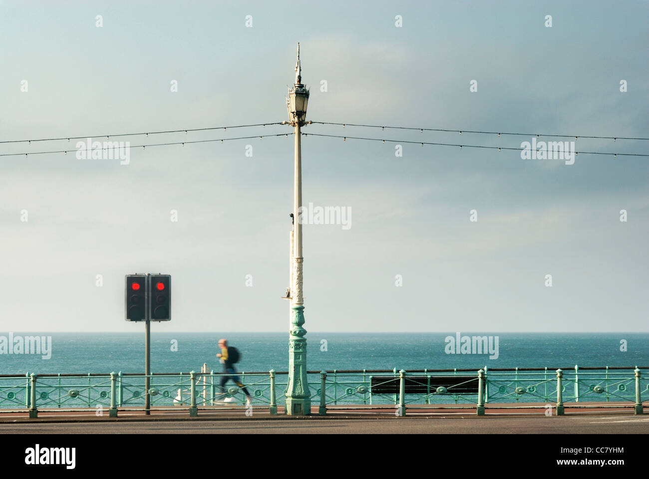 Jogger jogging along Brighton Seafront, east sussex,england,uk Stock Photo