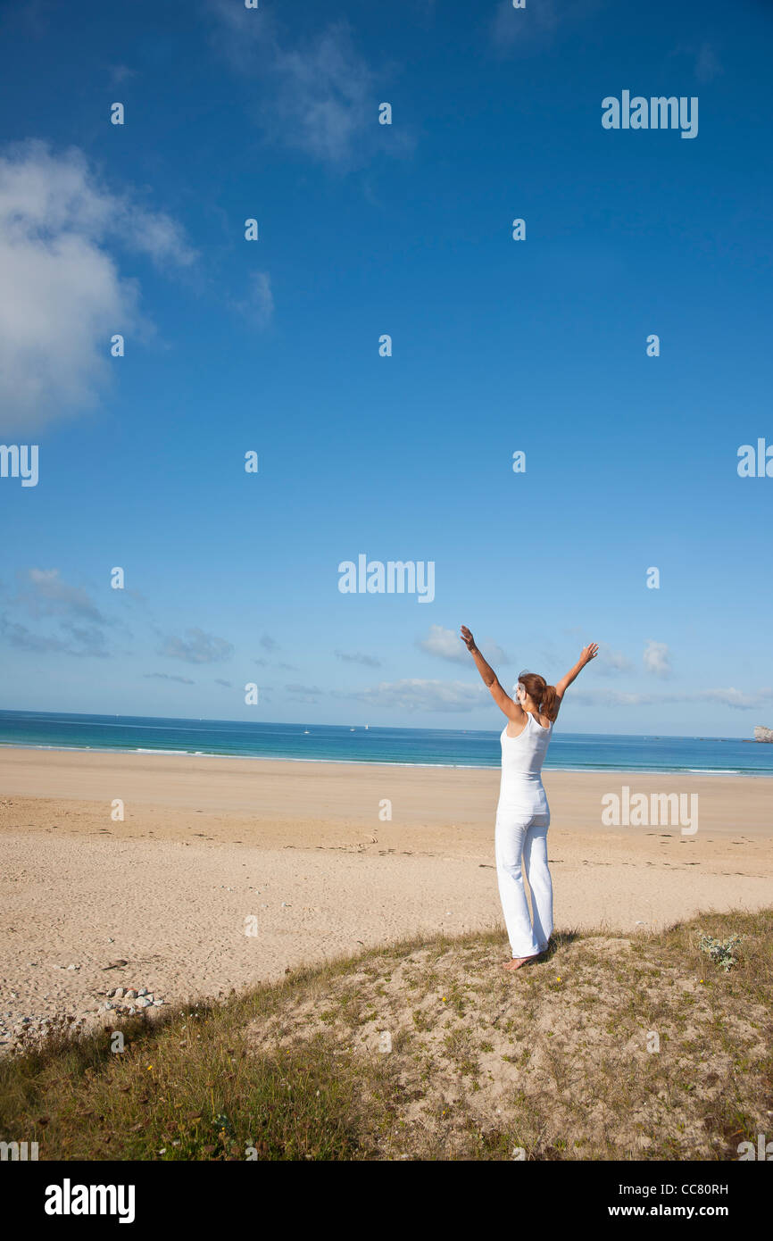 Woman on Beach, Camaret-sur-Mer, Finistere, Bretagne, France Stock Photo