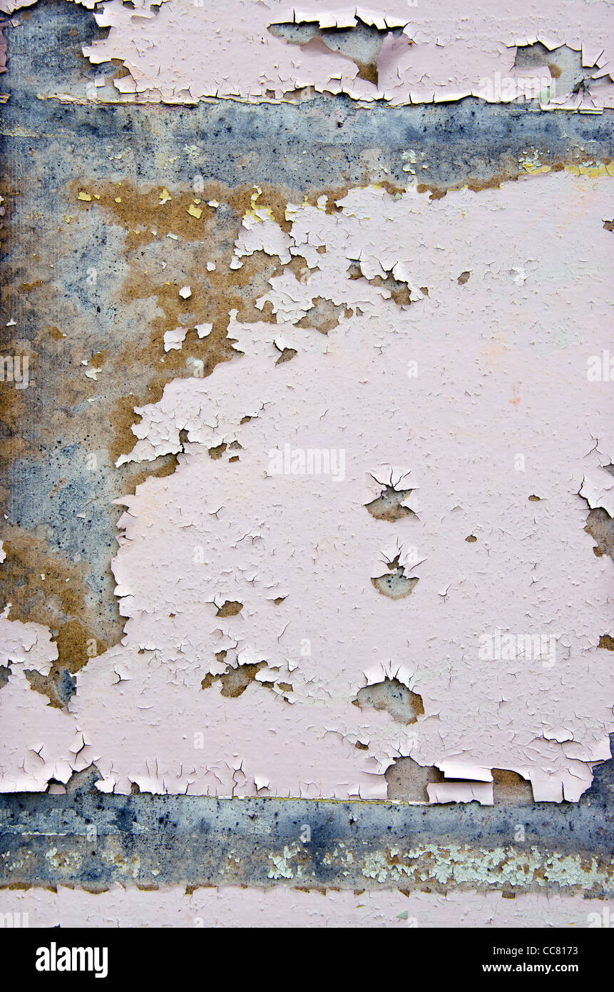 Old crumbling wall paint backdrop. Ancient architecture details. Stock Photo