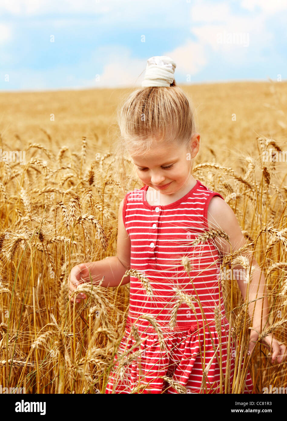 Child in wheat field Stock Photo - Alamy
