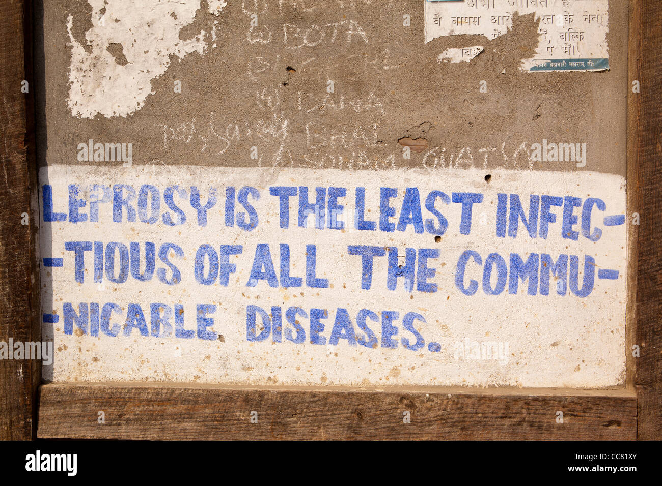 India, Arunachal Pradesh, Dirang, Health Education, Leprosy awareness painted slogan on old dzong wall Stock Photo
