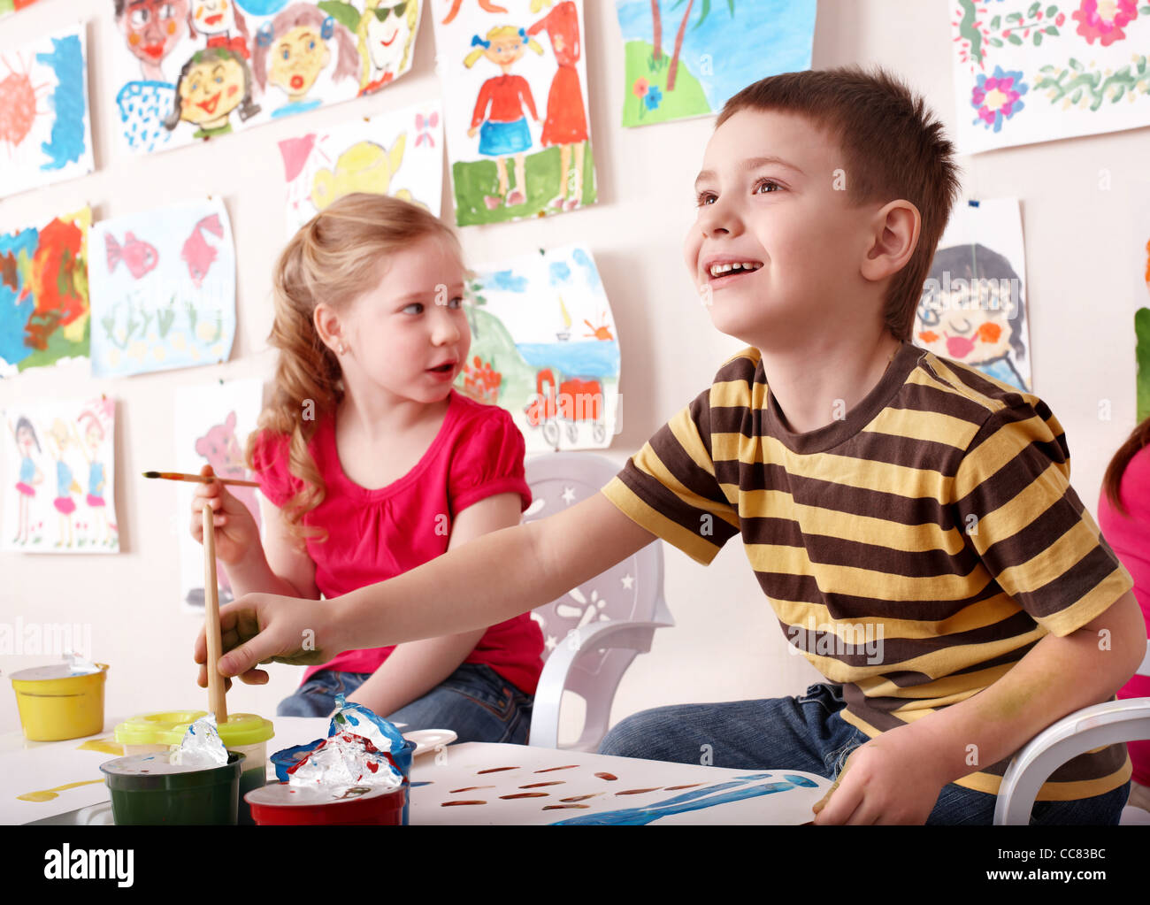 Children painting in art class Stock Photo - Alamy