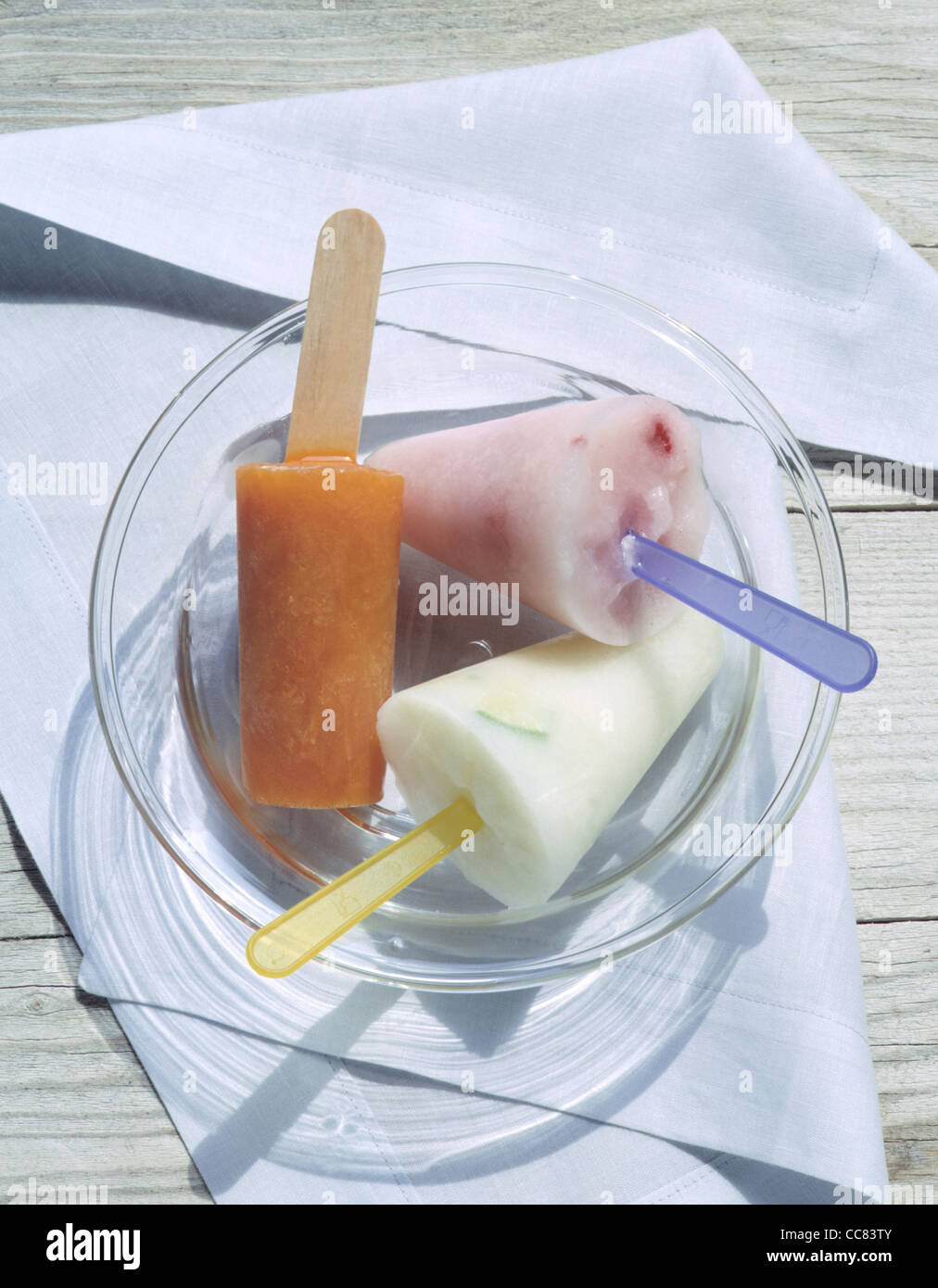 Yoghurt lime popsicle / mango peach popsicle / raspberry