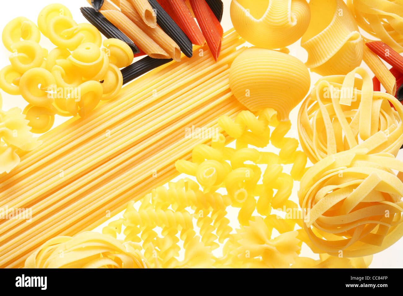 Close up shoot of different types of raw pasta. Stock Photo