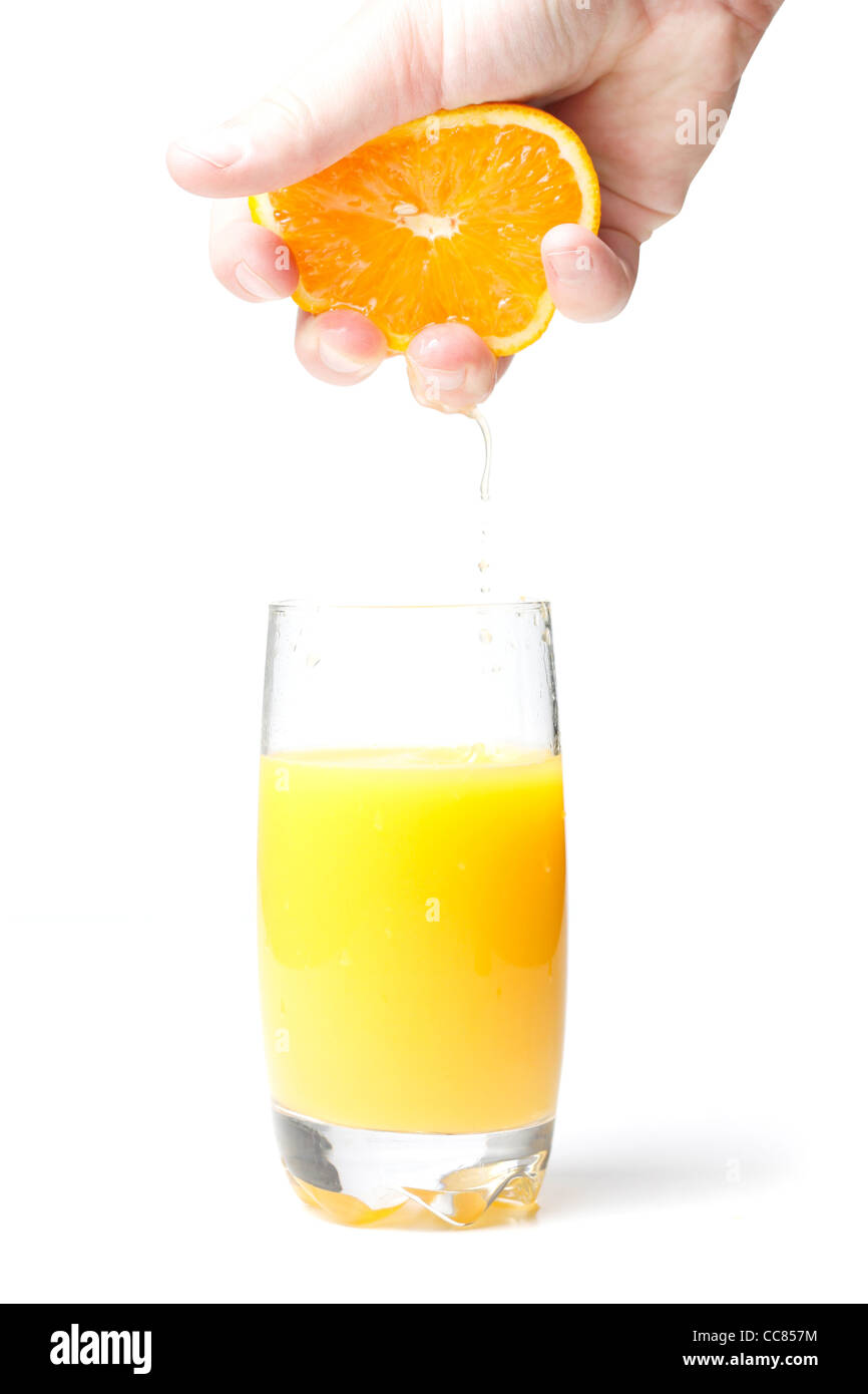 Squeezing orange juice Stock Photo Alamy