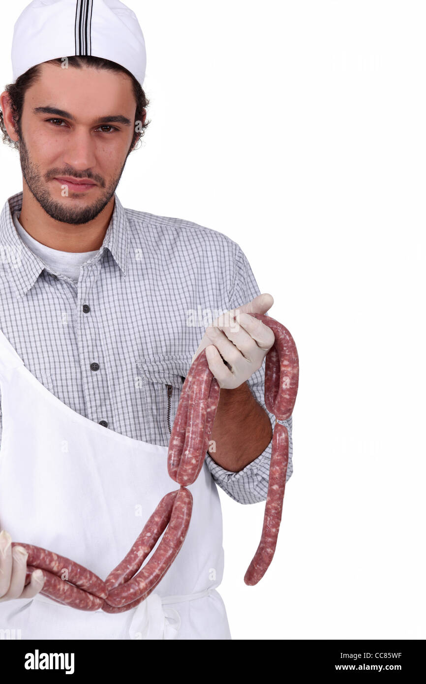 Butcher with sausages Stock Photo Alamy