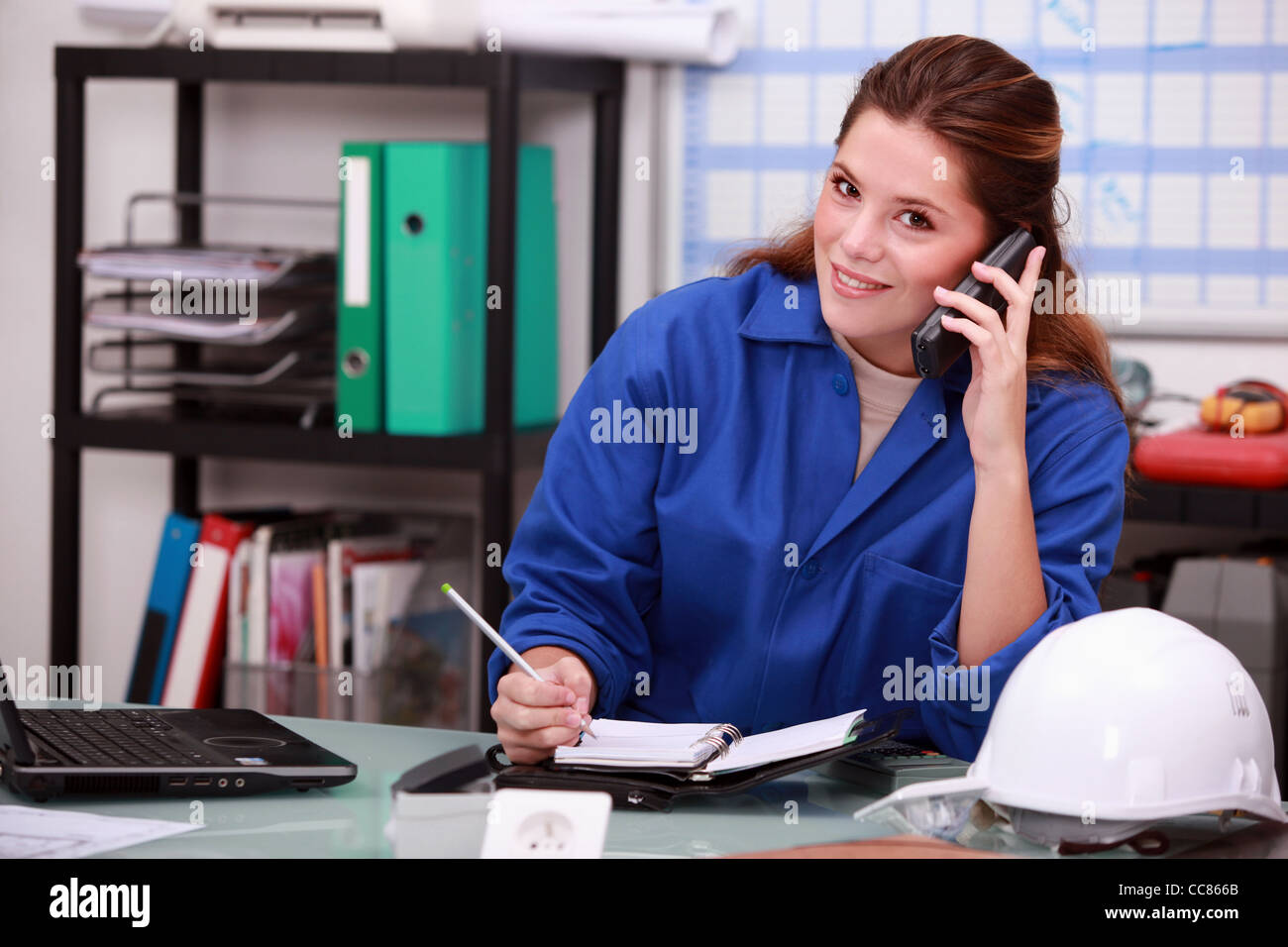 corporate woman answering  phone Stock Photo