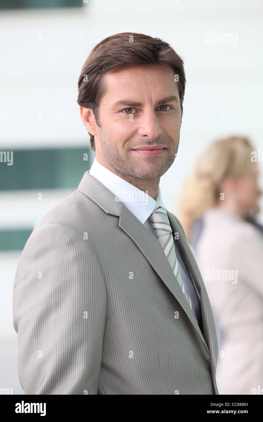Businessman in a suit Stock Photo - Alamy