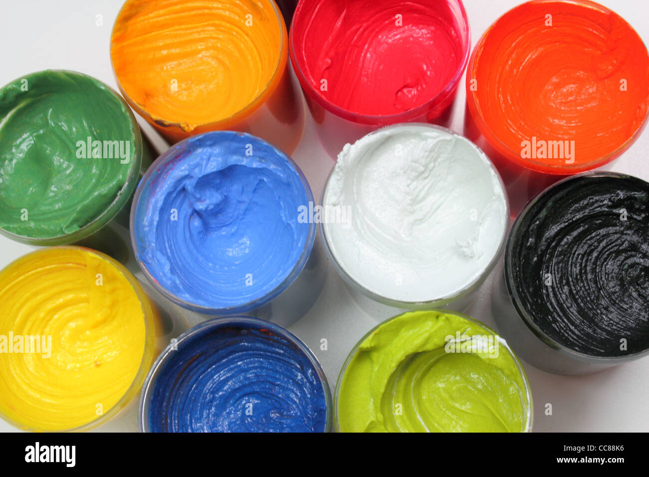 Opened paint buckets Stock Photo