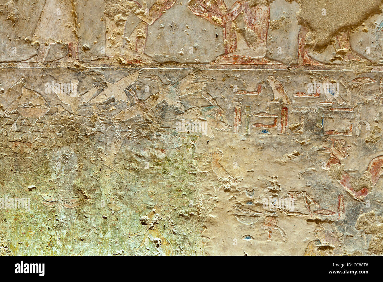 Reliefs in the Middle Kingdom tomb of Senbi Son of Ukh Hotep at Meir , North West of Asyut in Middle Egypt Stock Photo