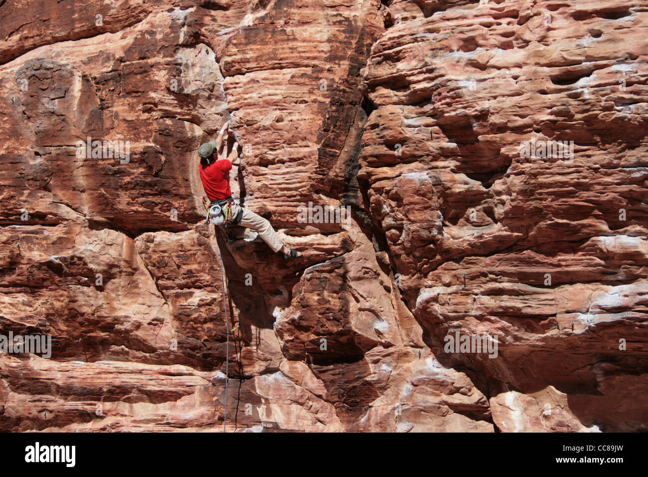 Climber scaling overhanging cliff hires stock photography and images
