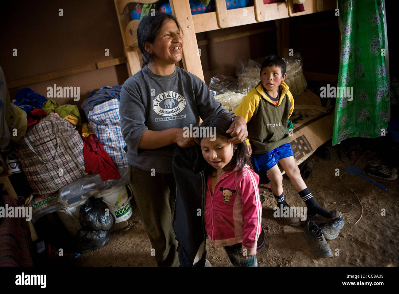 A family at home in the Pueblos Jovenes of Lima, Peru, South America. Stock Photo