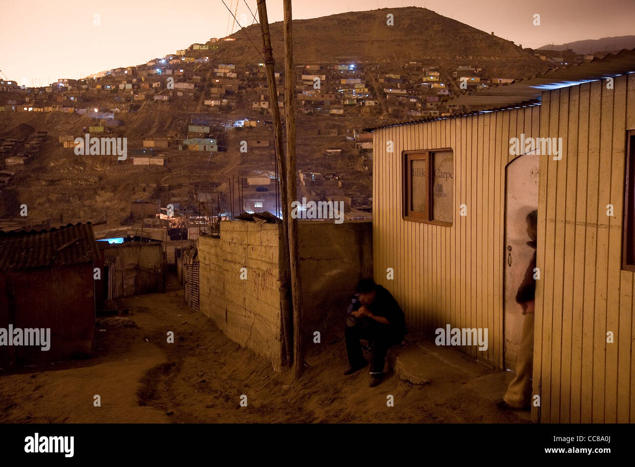 Slums of Lima, Peru at night - South America. Stock Photo