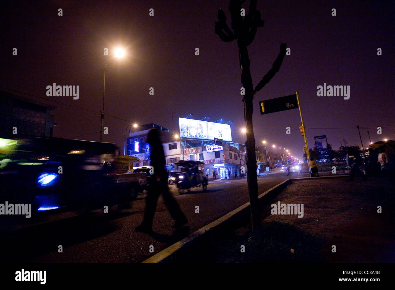 Traffic at night in Villa el Salvador - Lima, Peru, South America. Stock Photo