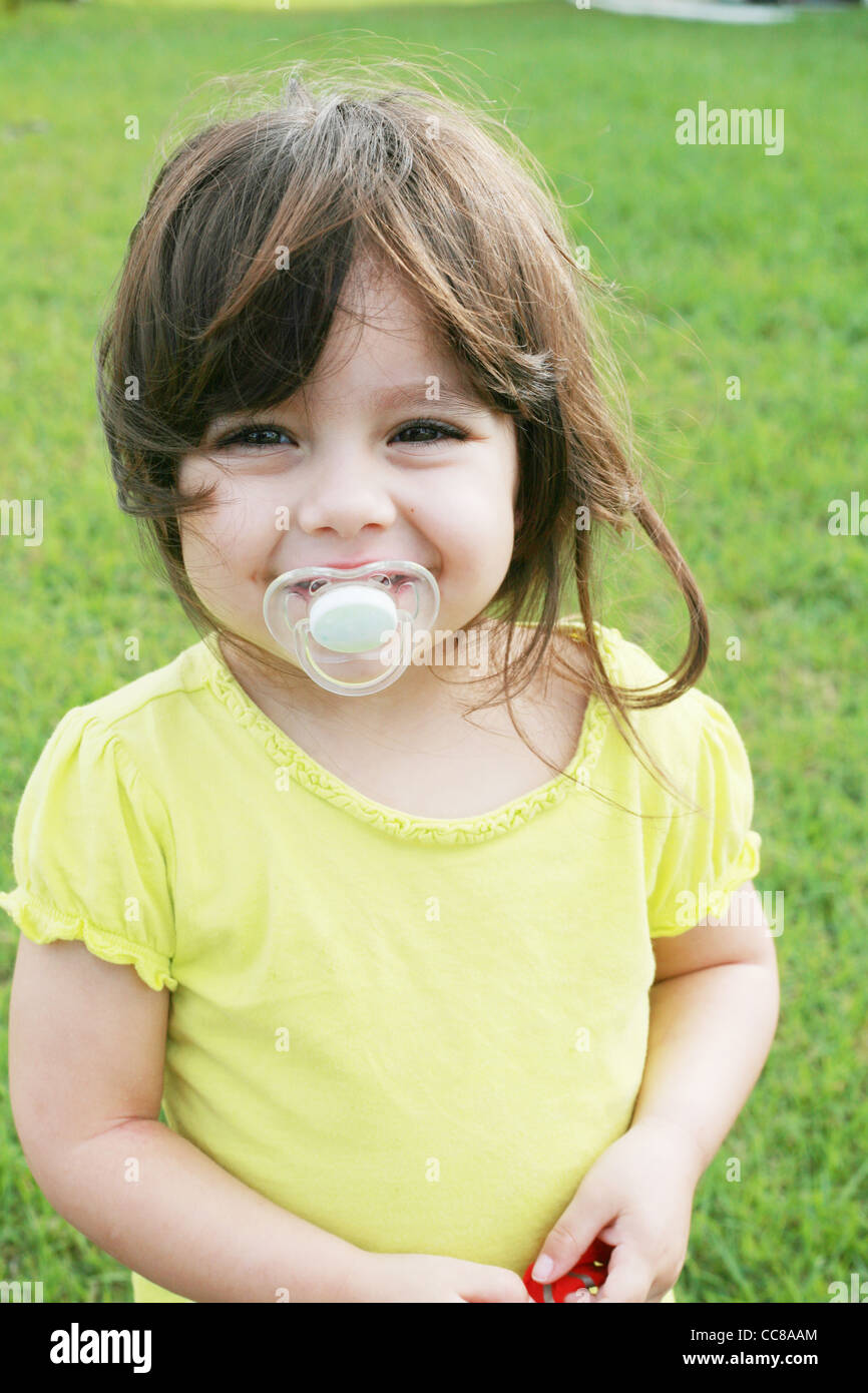 baby girl with pacifier Stock Photo Alamy