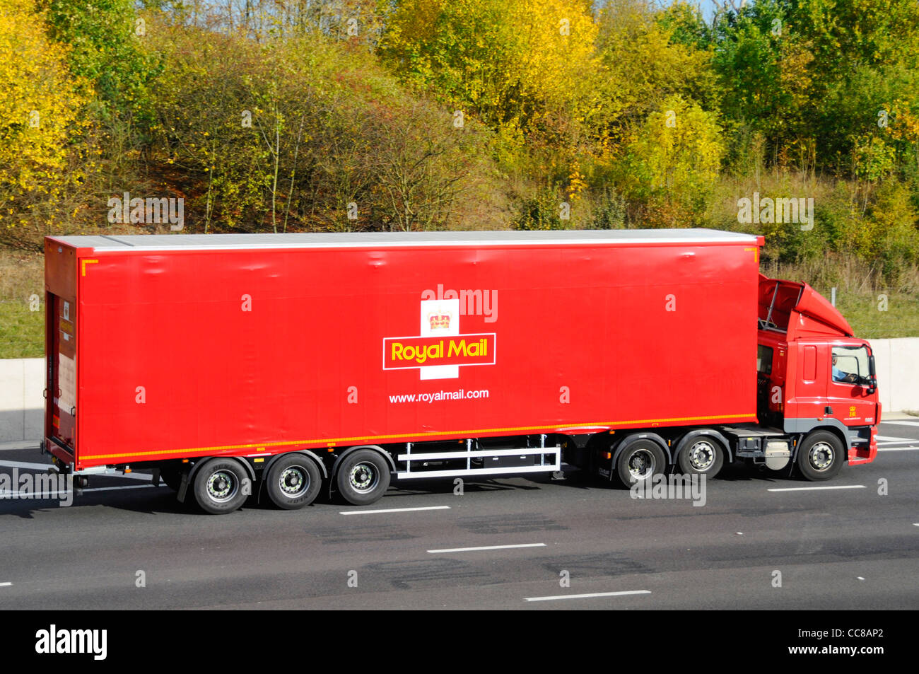 Side view of red Royal Mail logistics hgv distribution lorry truck