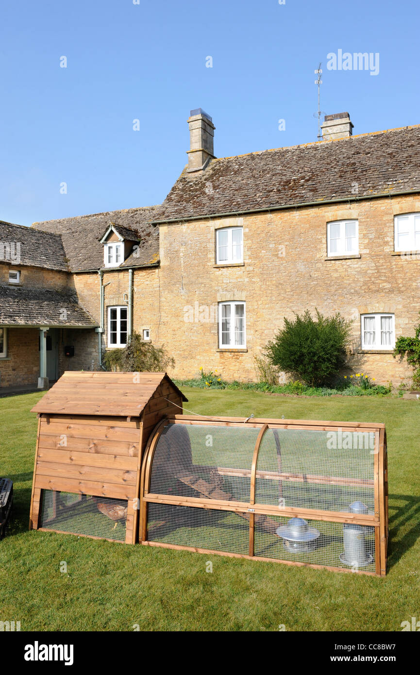 A chicken hutch in a Cotswold cottage garden UK Stock Photo