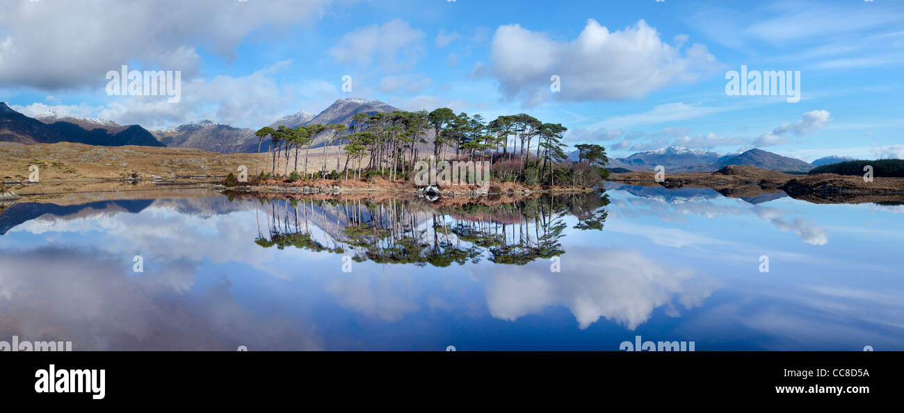 Winter reflection of the Twelve Bens in Derryclare Lough, Connemara, County Galway, Ireland. Stock Photo