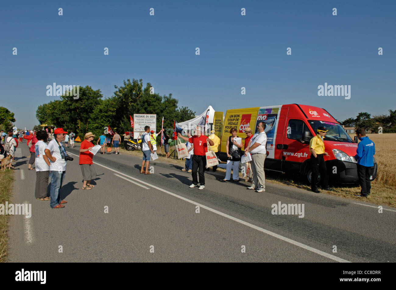 Souvenir vendors on the Tour de France at the Passage du Gois in the