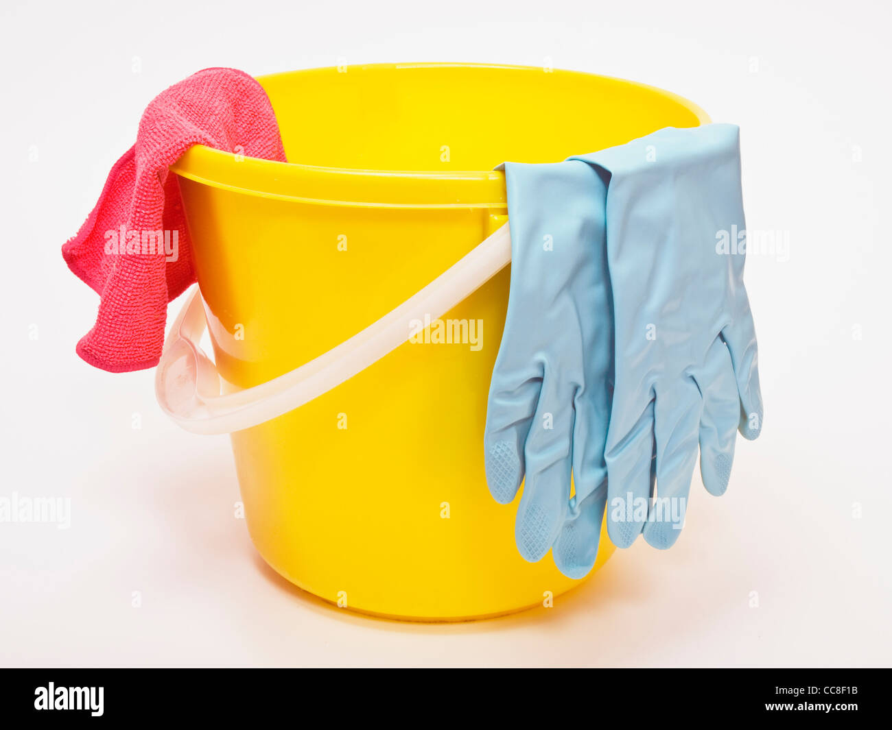 Detail view of a bucket with rubber gloves and a cloth Stock Photo