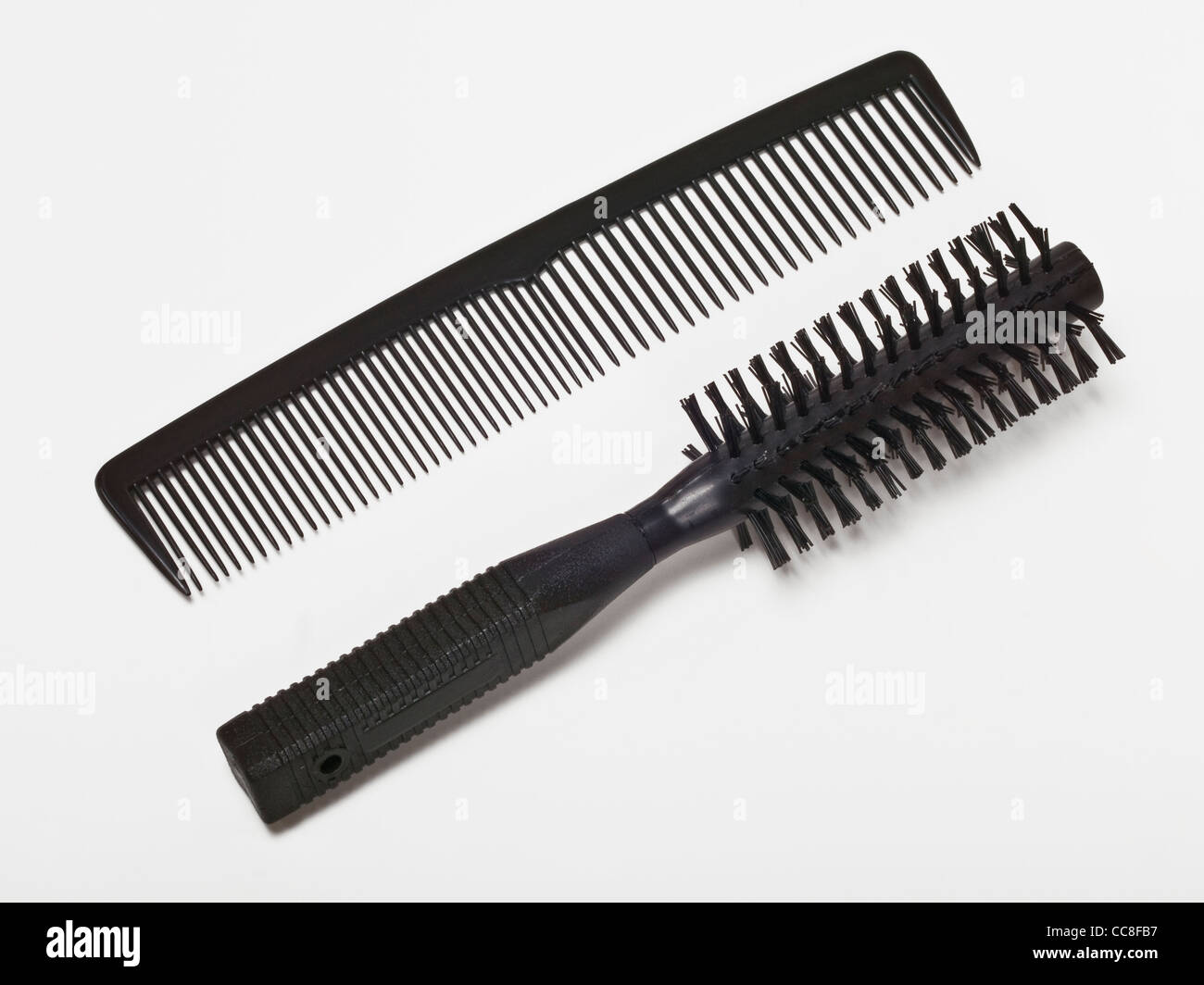 Detailansicht von Kamm und Haarbürste | Detail photo of a comb and a hairbrush Stock Photo