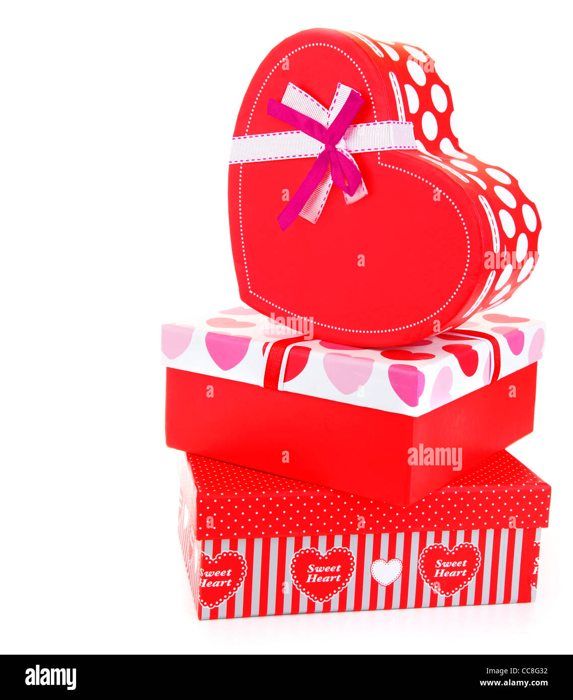 Red romantic gift boxes isolated on white background Stock Photo - Alamy