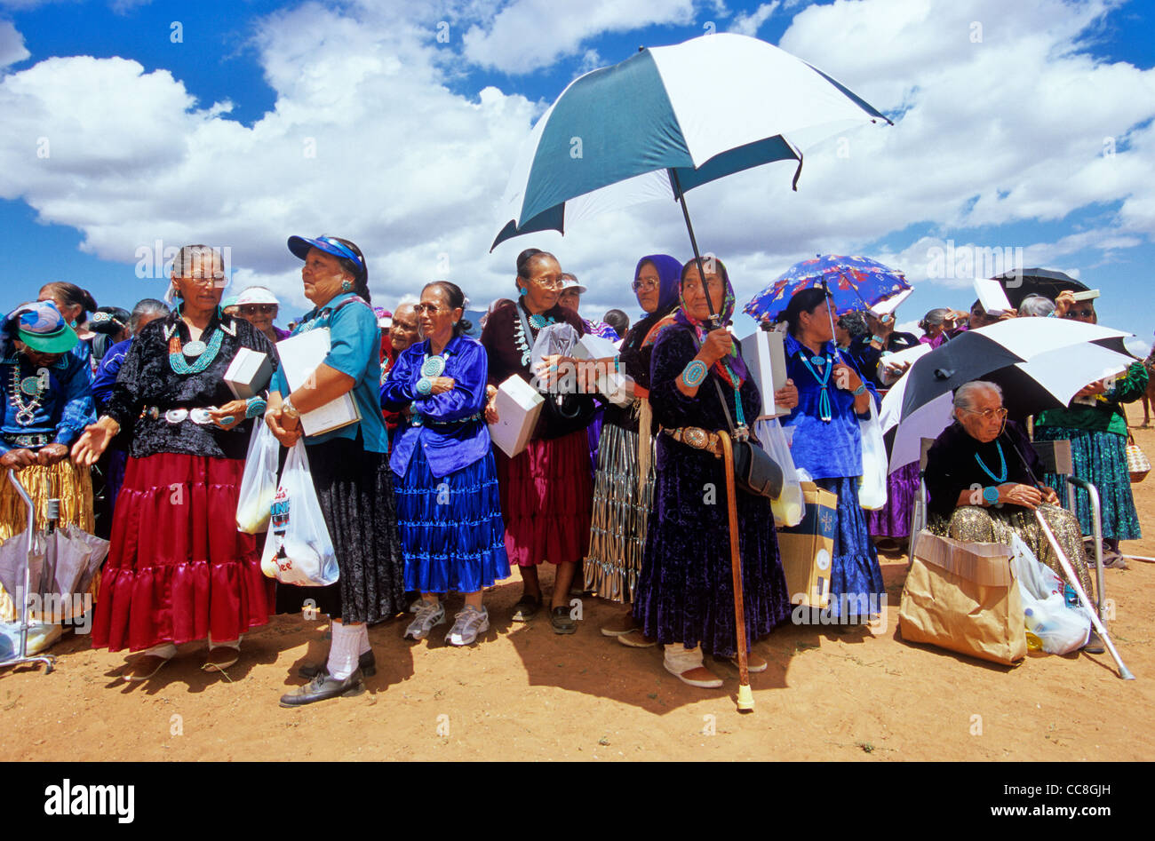 Navajo elders, women watch events at Fairgrounds during the Pioneer Day Fair at Navajo Mountain, Navajo Nation, Utah, USA Stock Photo
