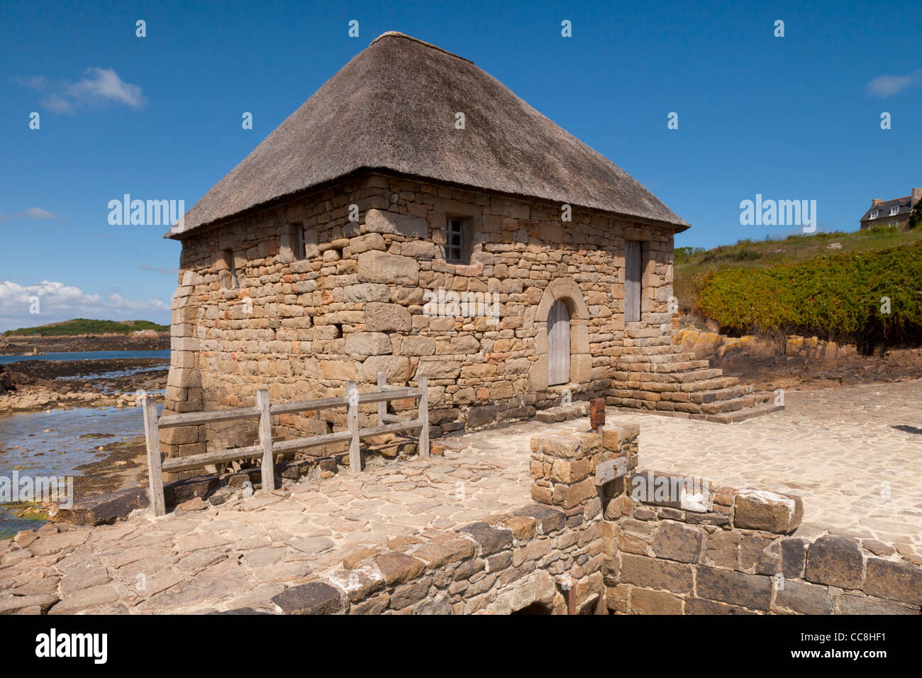 The Moulin de Berlot, an old tide mill on the Ile de Brehat, off the coast of Brittany, France. Stock Photo