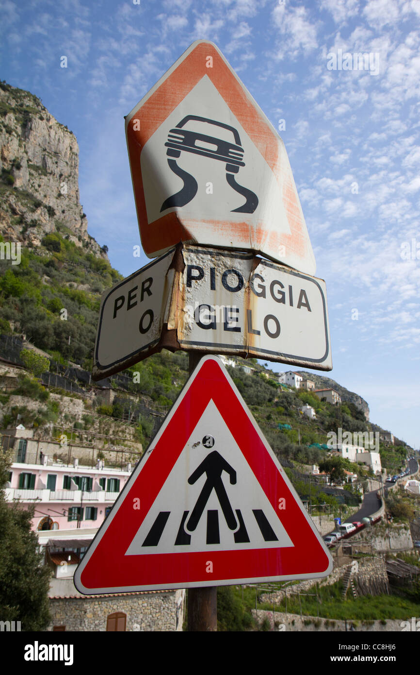 A battered road sign close to Amalfi Stock Photo