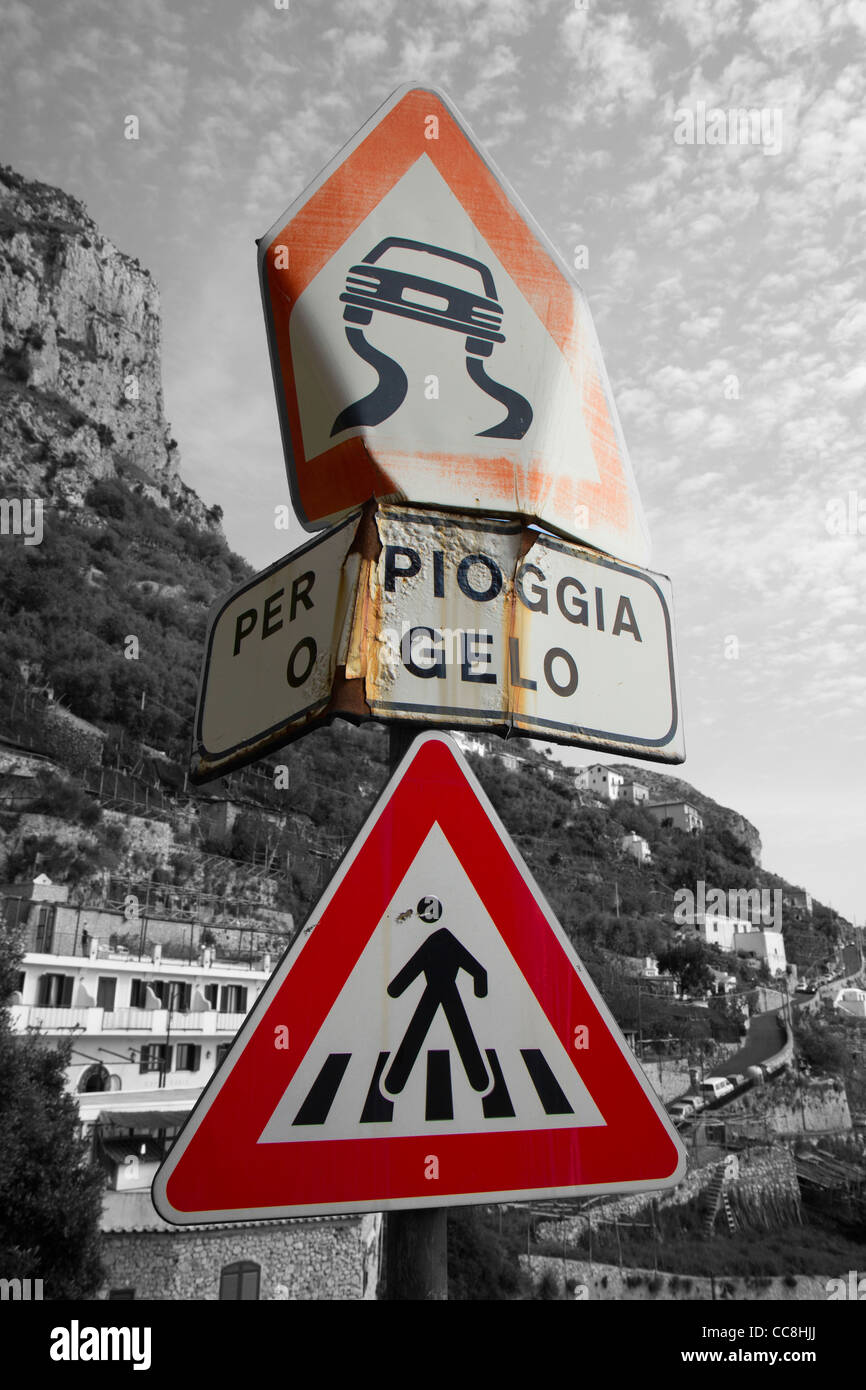 A battered road sign close to Amalfi Stock Photo