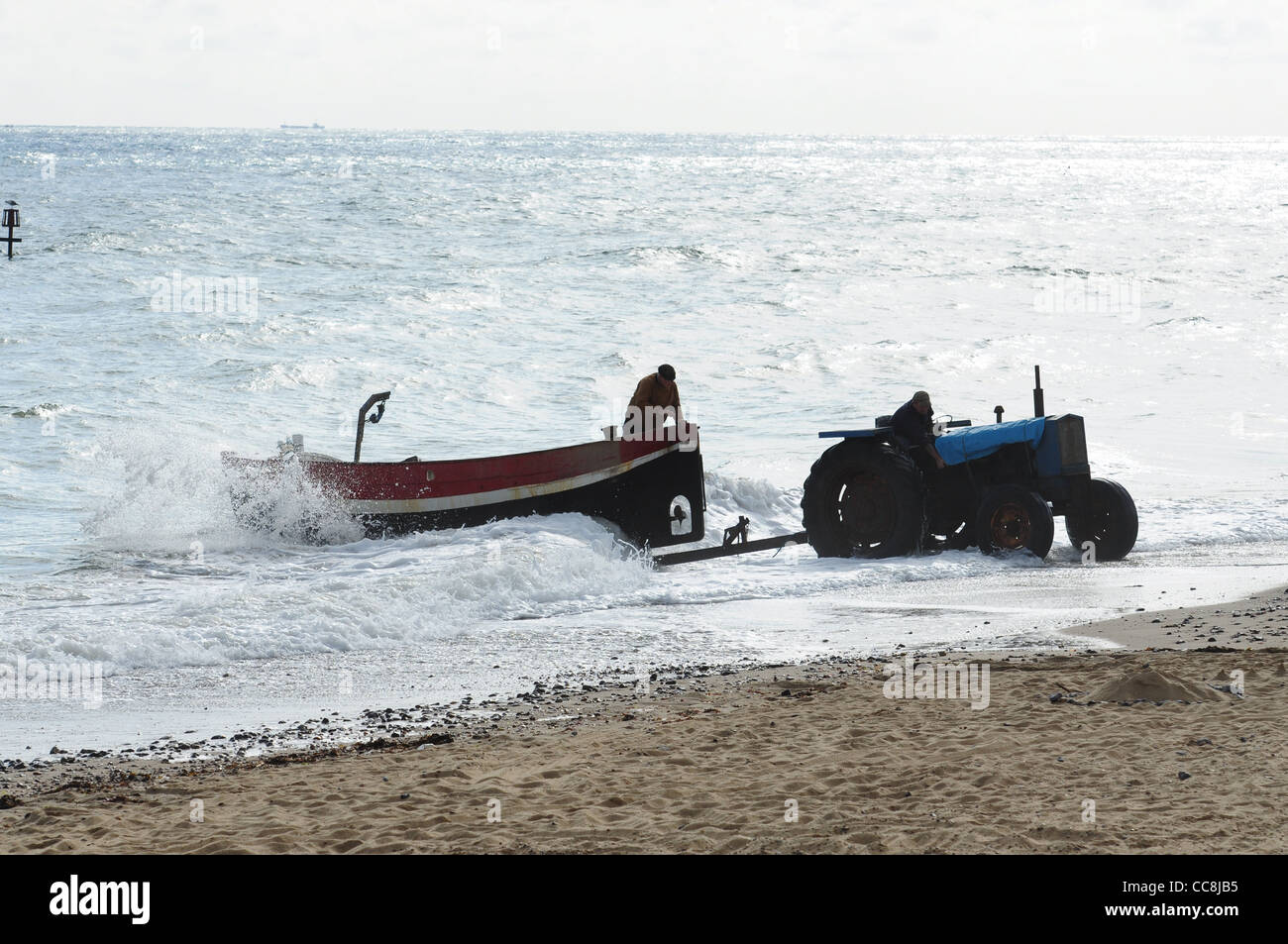 traditional crab boat launching at Cromer, Norfolk Stock Photo Alamy