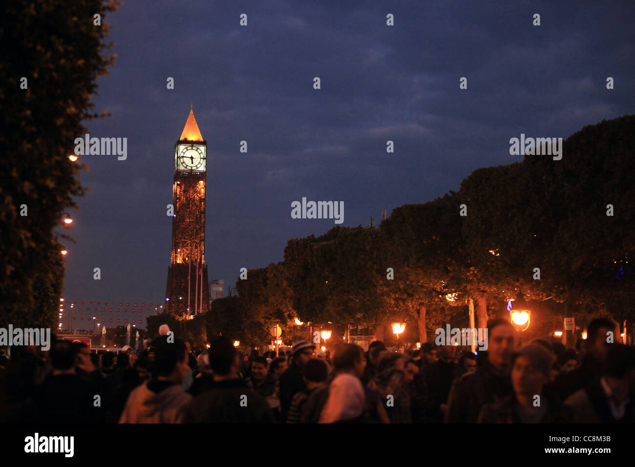 people, landmarks, tunis, revolution, celebration, tunisia, crowd, night, view, city, sky, blue, time, watch, Stock Photo