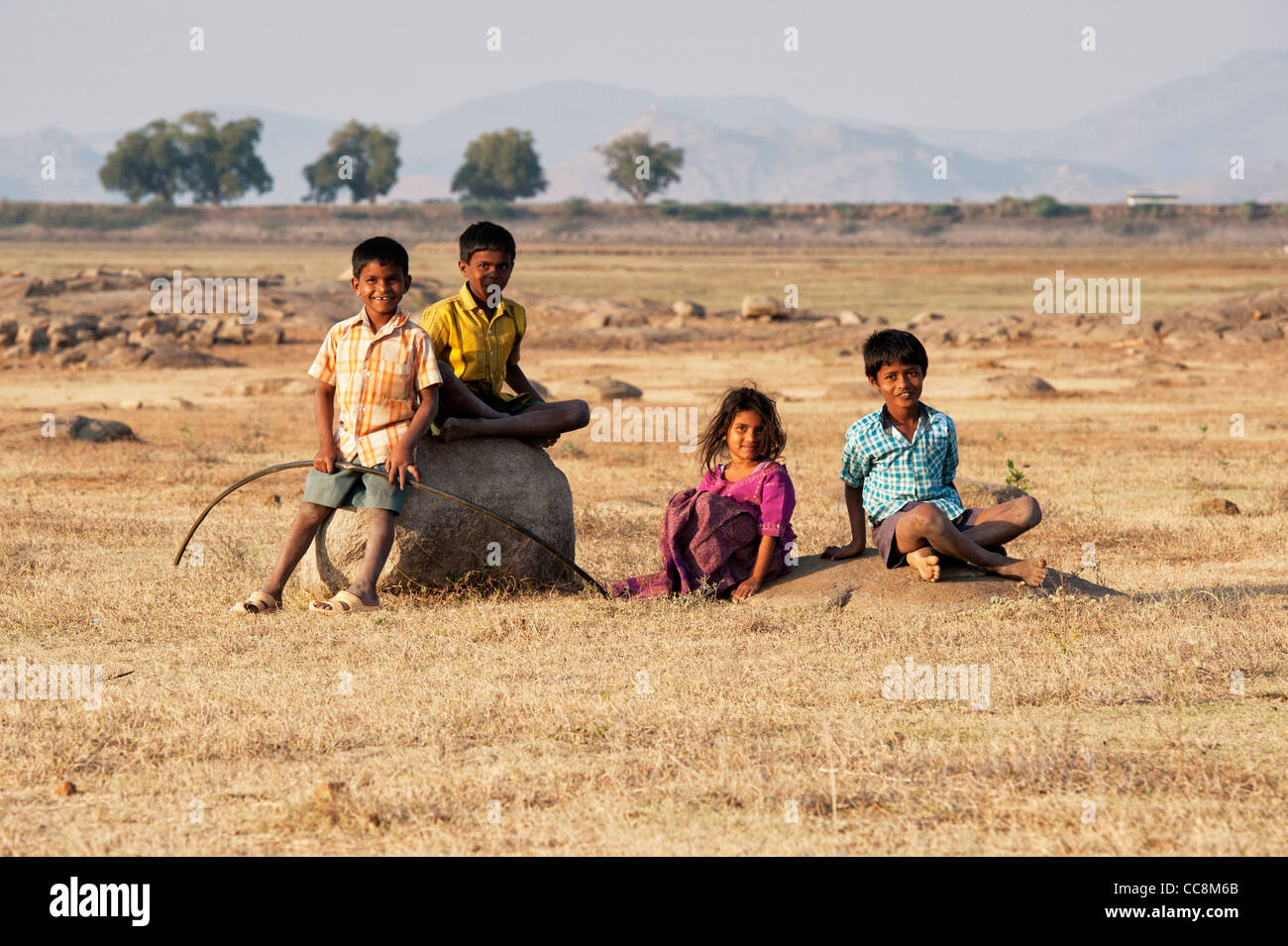 Lower caste Indian children. Sons and daughter of an Indian goat herding family. Andhra Pradesh, India Stock Photo