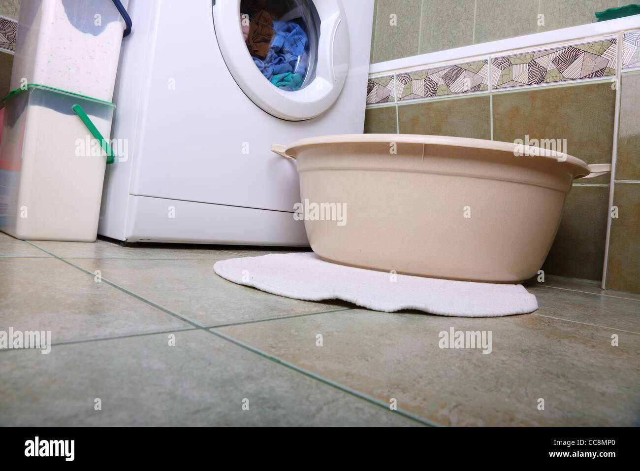 towels in washing machine cloths indoor bathroom Stock Photo Alamy