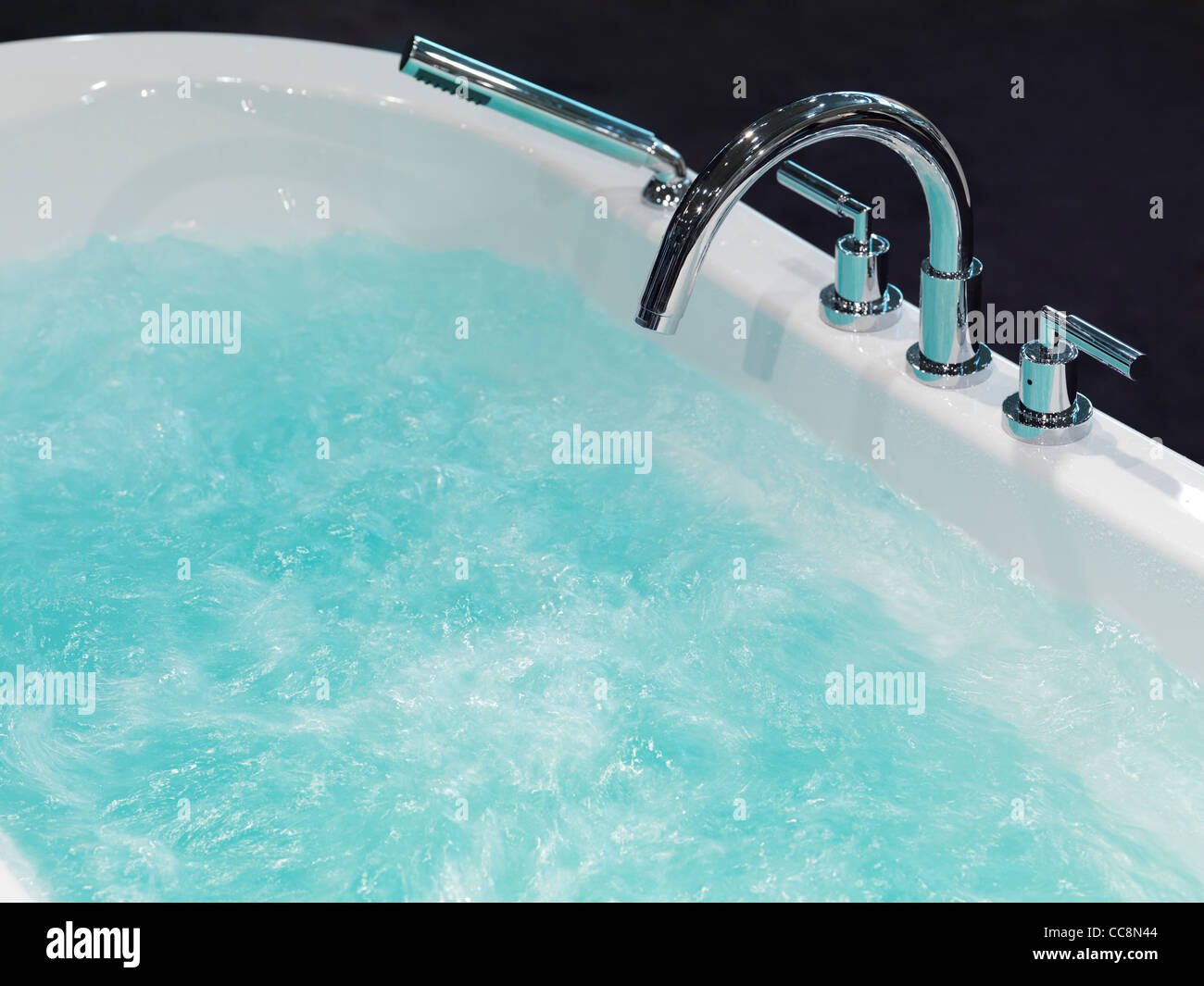 Agitated water in a hydromassage bath Stock Photo