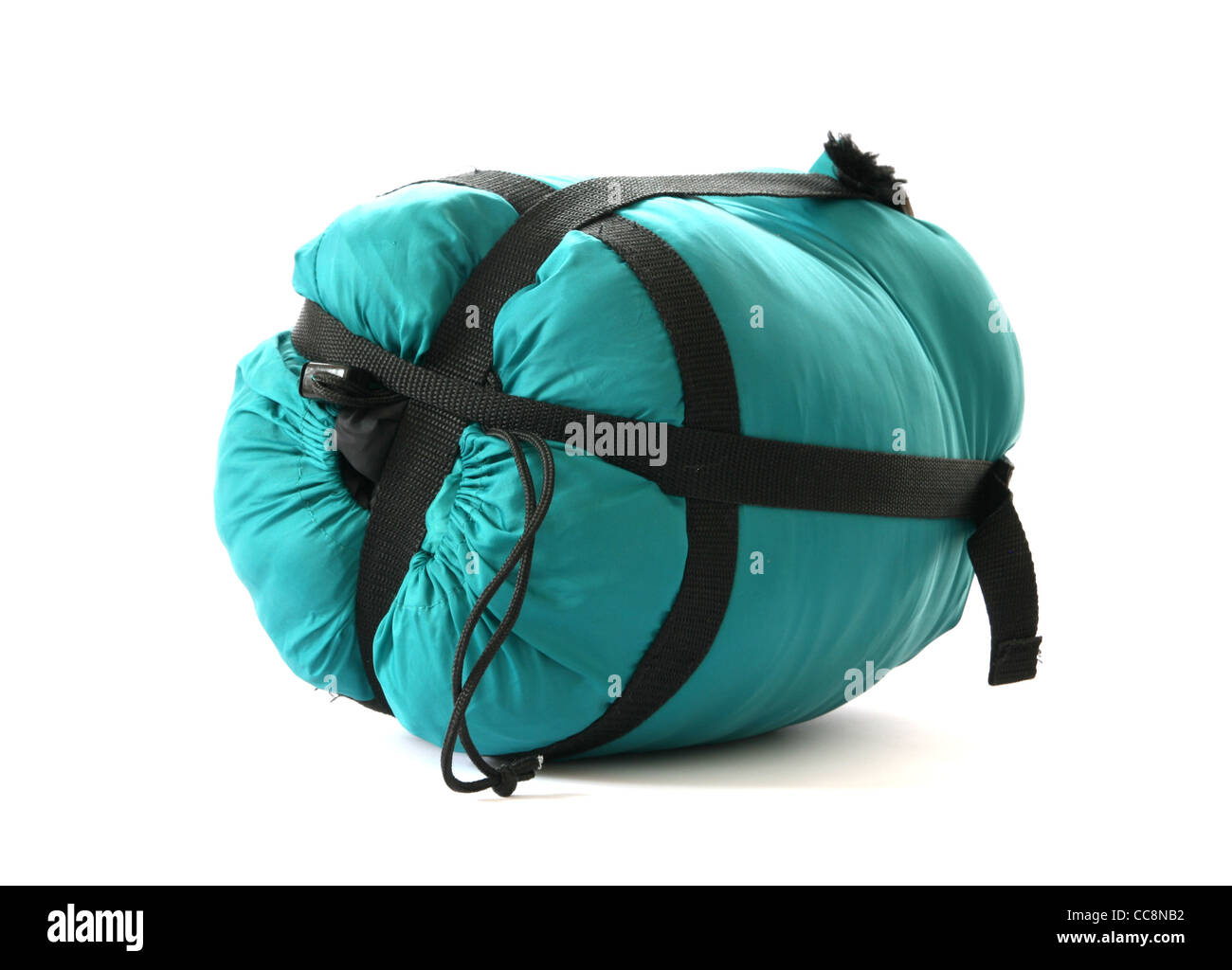 Packed sleepingbag on white background Stock Photo Alamy