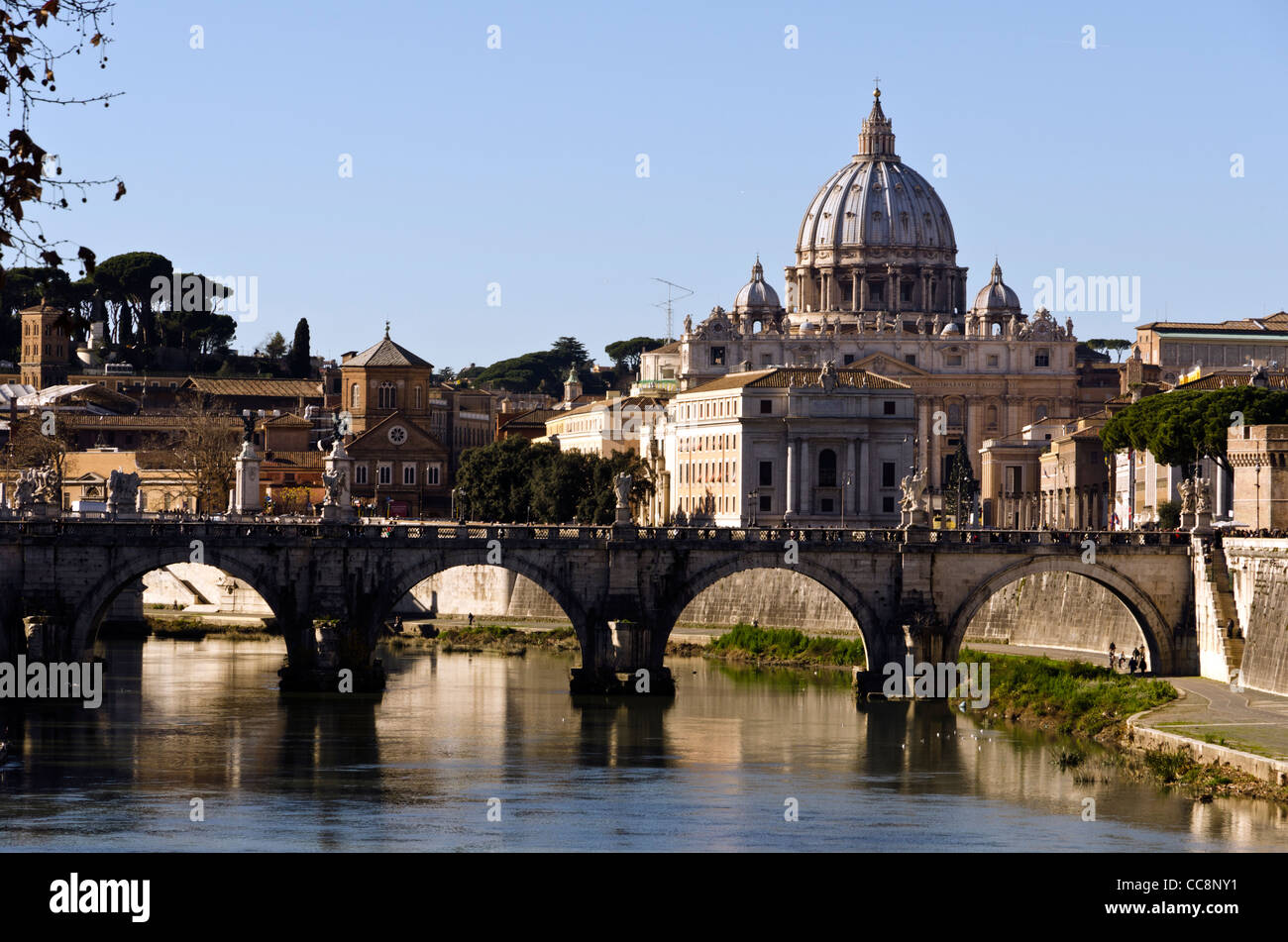 Tevere river and Sant' Angelo bridge with St Peter's Basilica in the background Vatican City Rome Italy Stock Photo