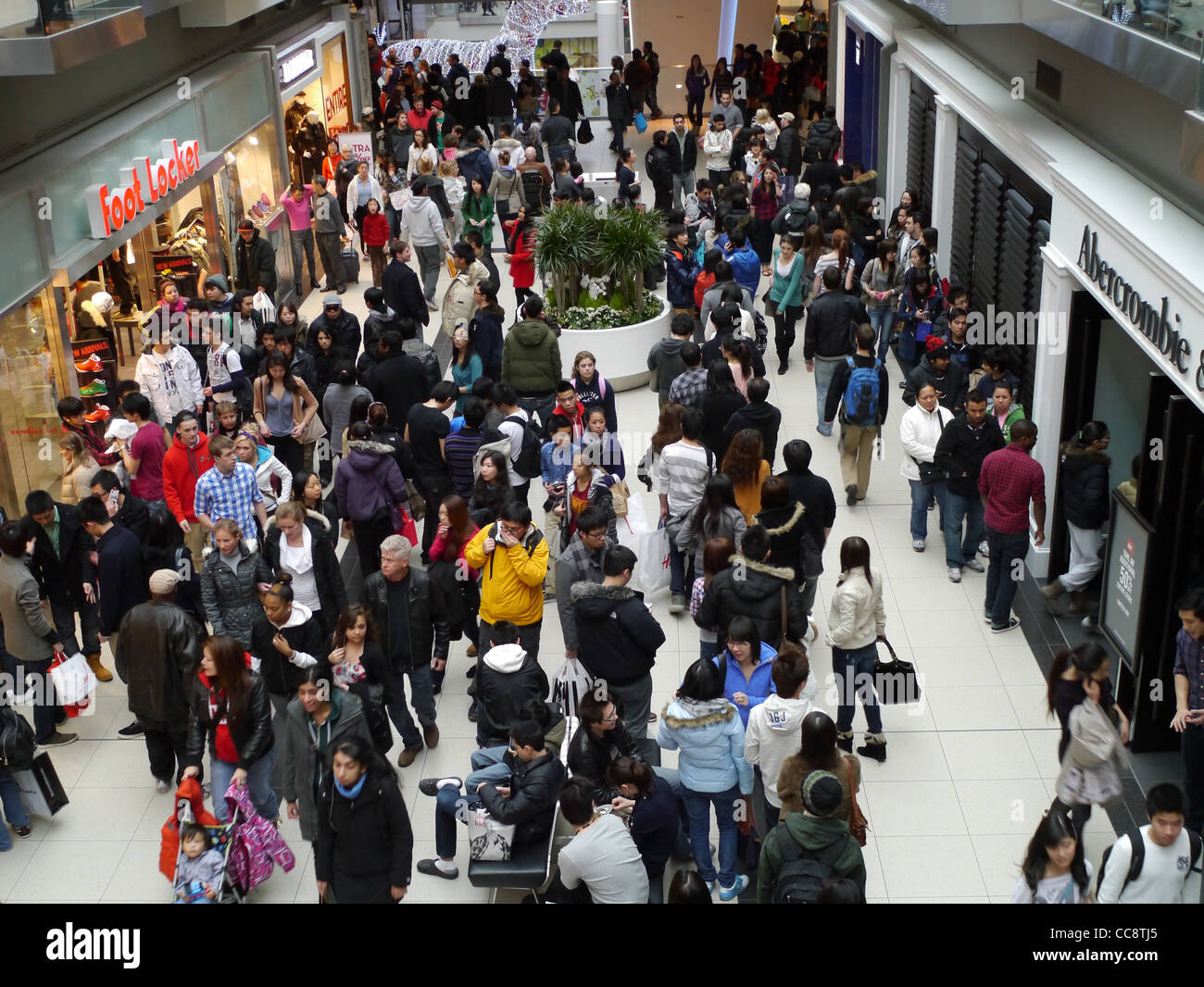 Crowded shopping mall interior, Toronto Eaton Centre after-Christmas Boxing Day Sale Stock Photo