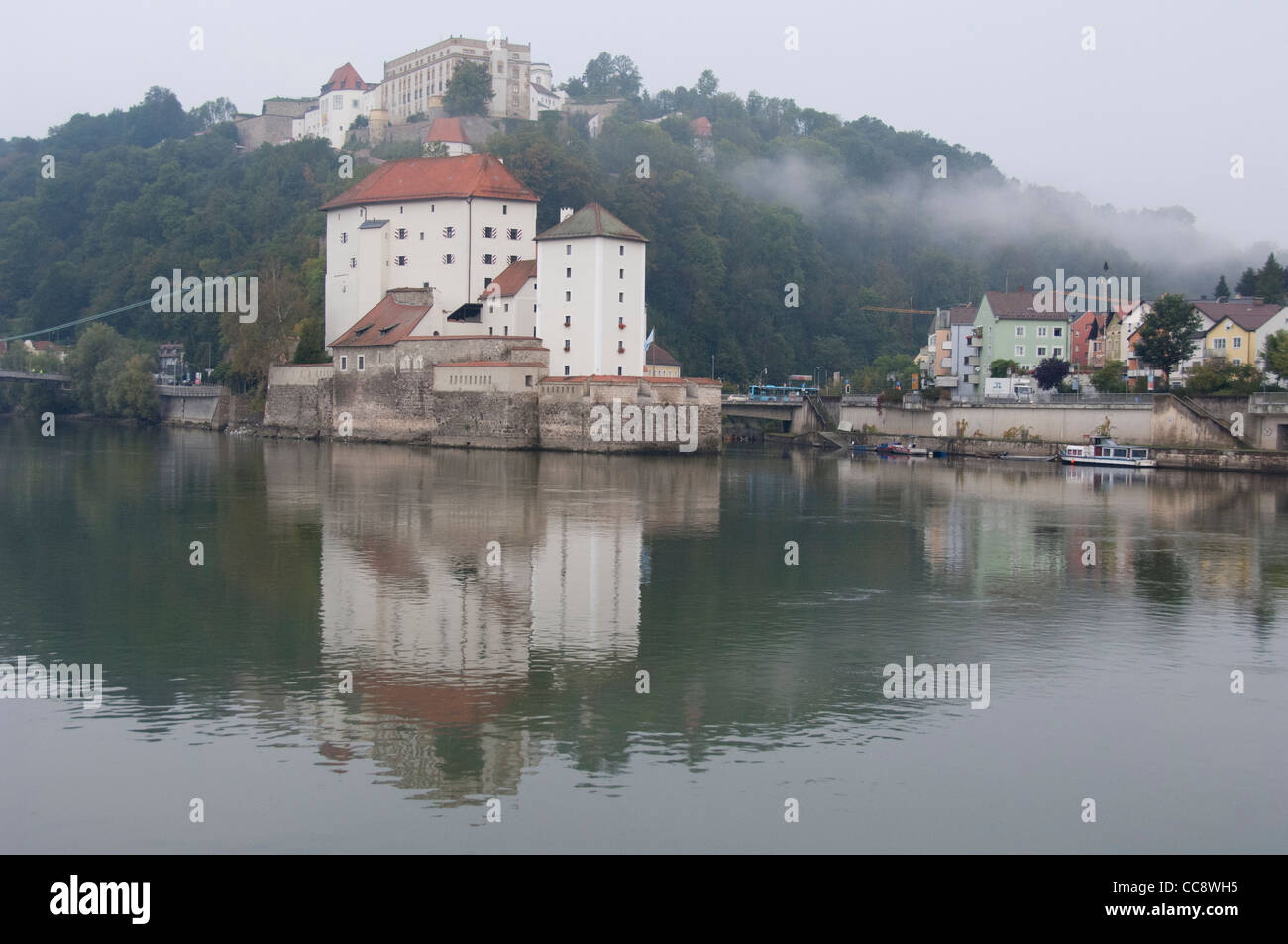 Germany, Passau. Confluence of Danube & Ilz rivers in front of the historic Veste Neiderhaus. Stock Photo