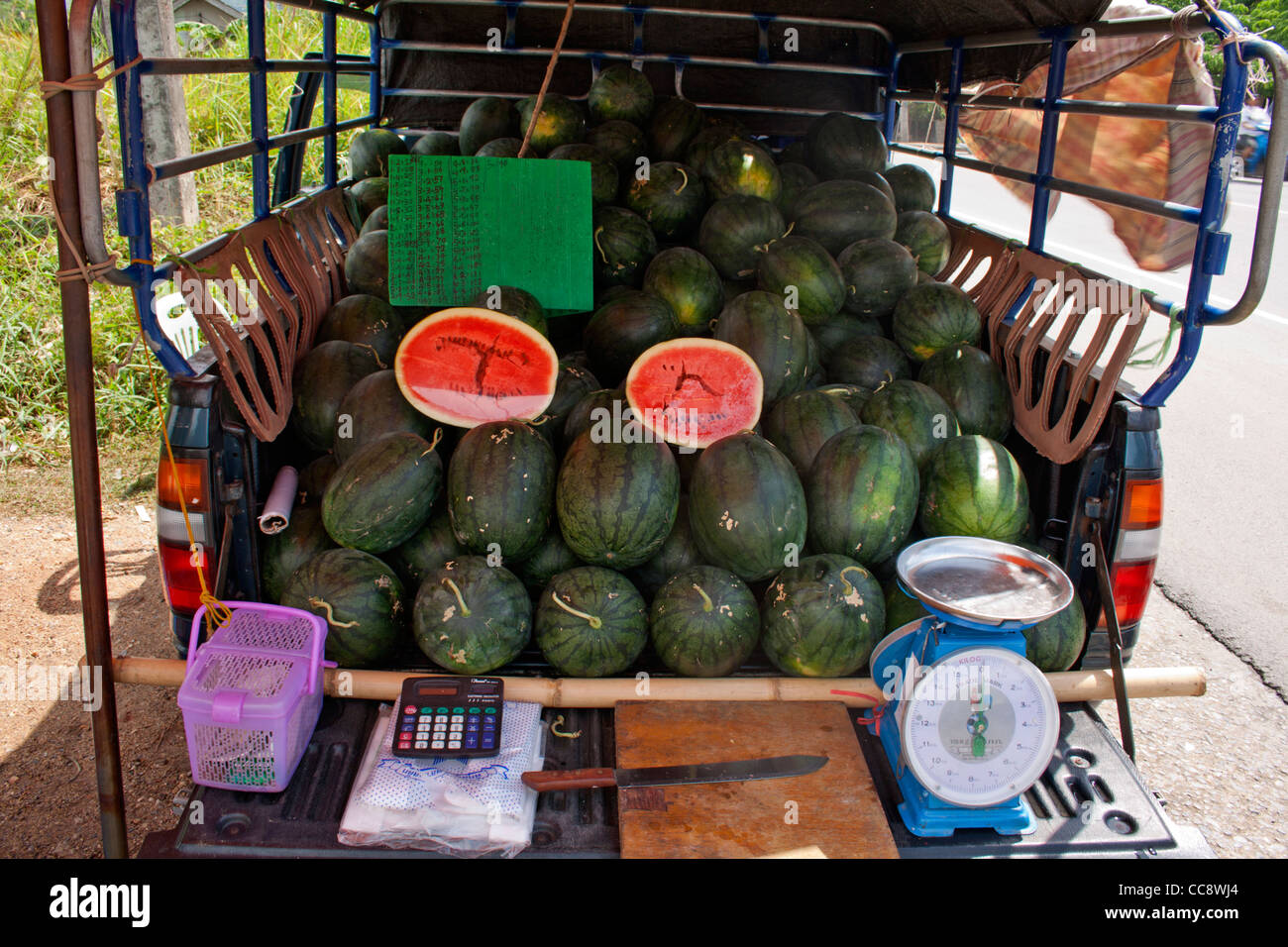 Water Melons for sale, Roadside, Thailand Stock Photo