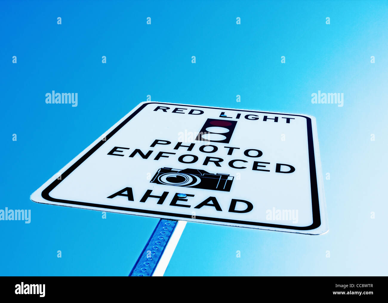 red light intersection surveillance camera sign Stock Photo Alamy