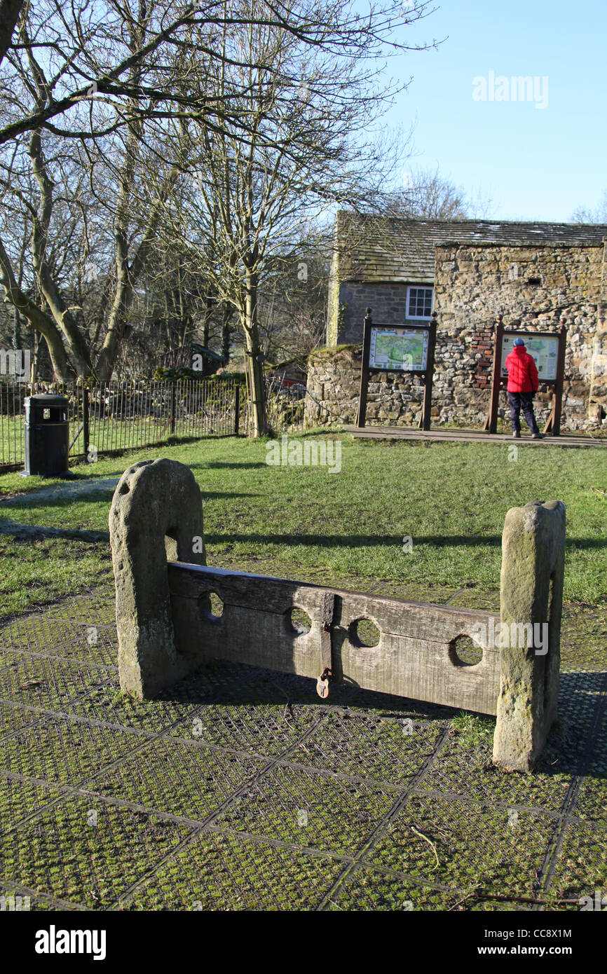 Medieval Stocks in the Derbyshire Plague Village of Eyam Stock Photo