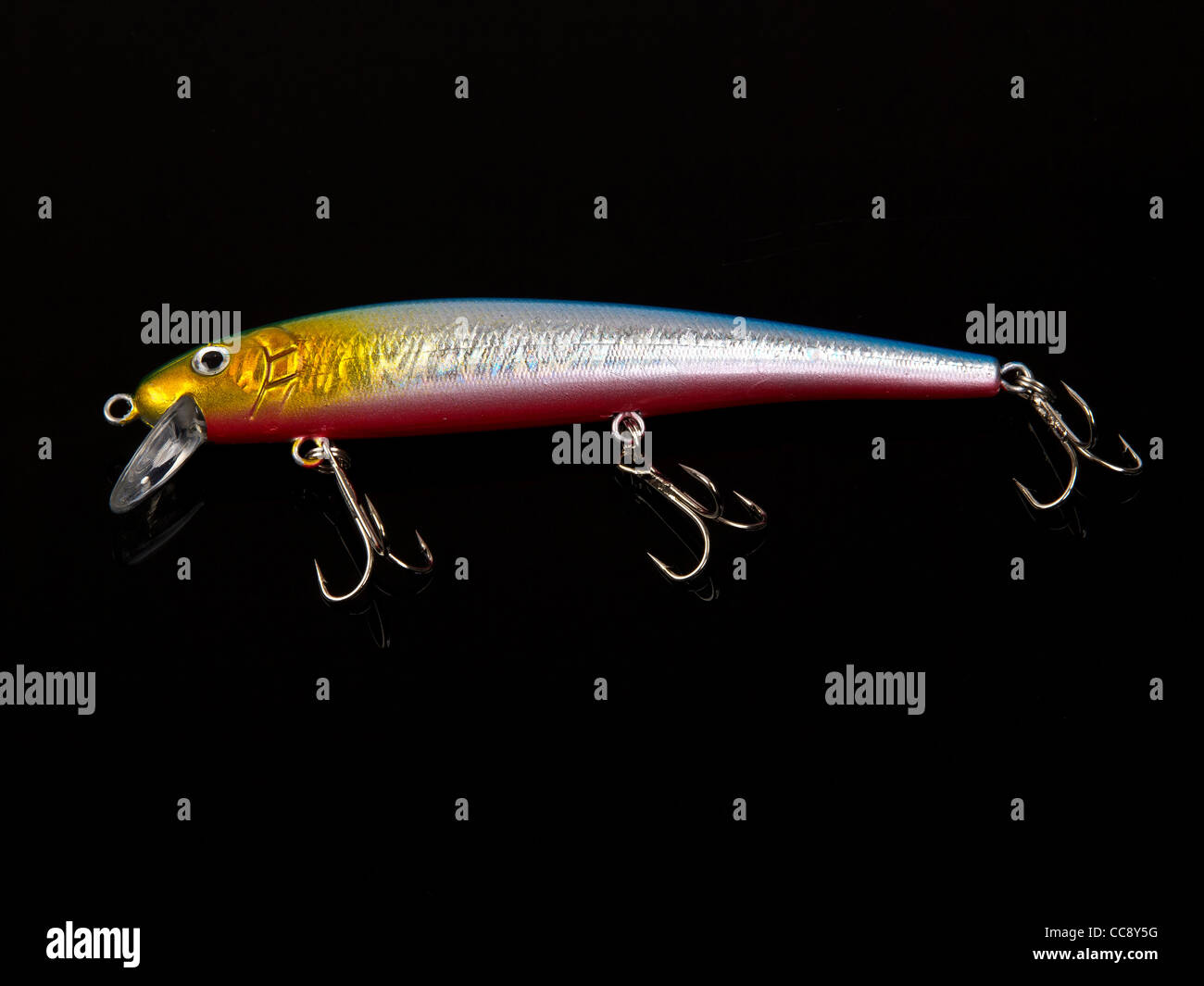metal pendant on spinning fishing-rod bait Stock Photo - Alamy