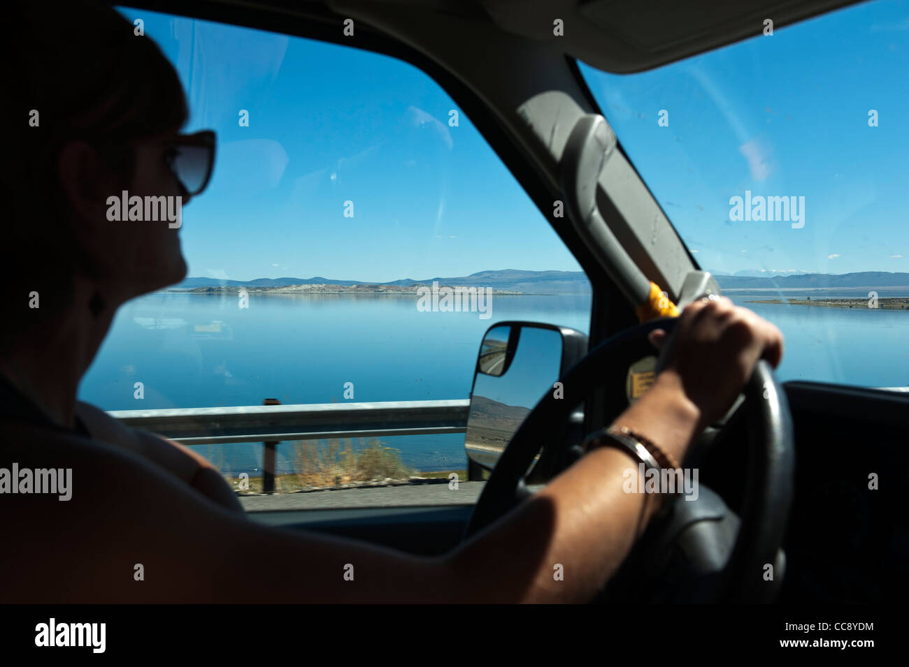 Driving along Highway 395 by Mono Lake, California. USA Stock Photo