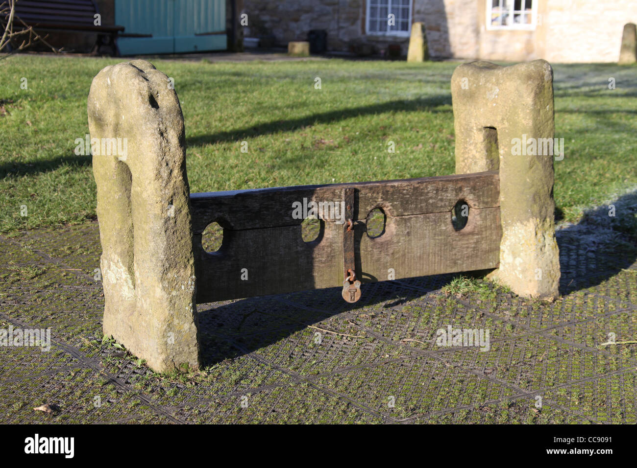 Medieval Stocks in the Derbyshire Plague Village of Eyam Stock Photo