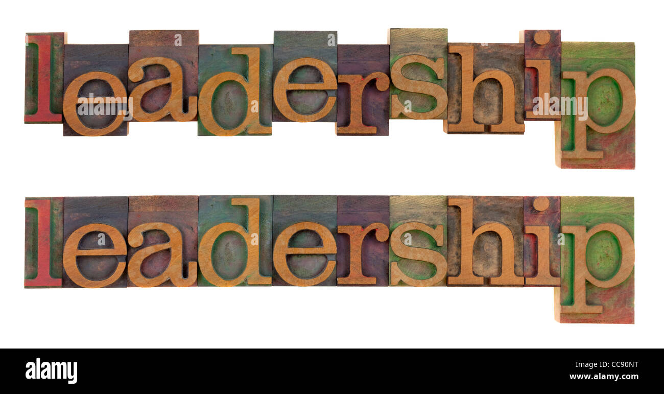 the word leadership in vintage wooden letterpress type blocks, stained by color ink, isolated on white Stock Photo