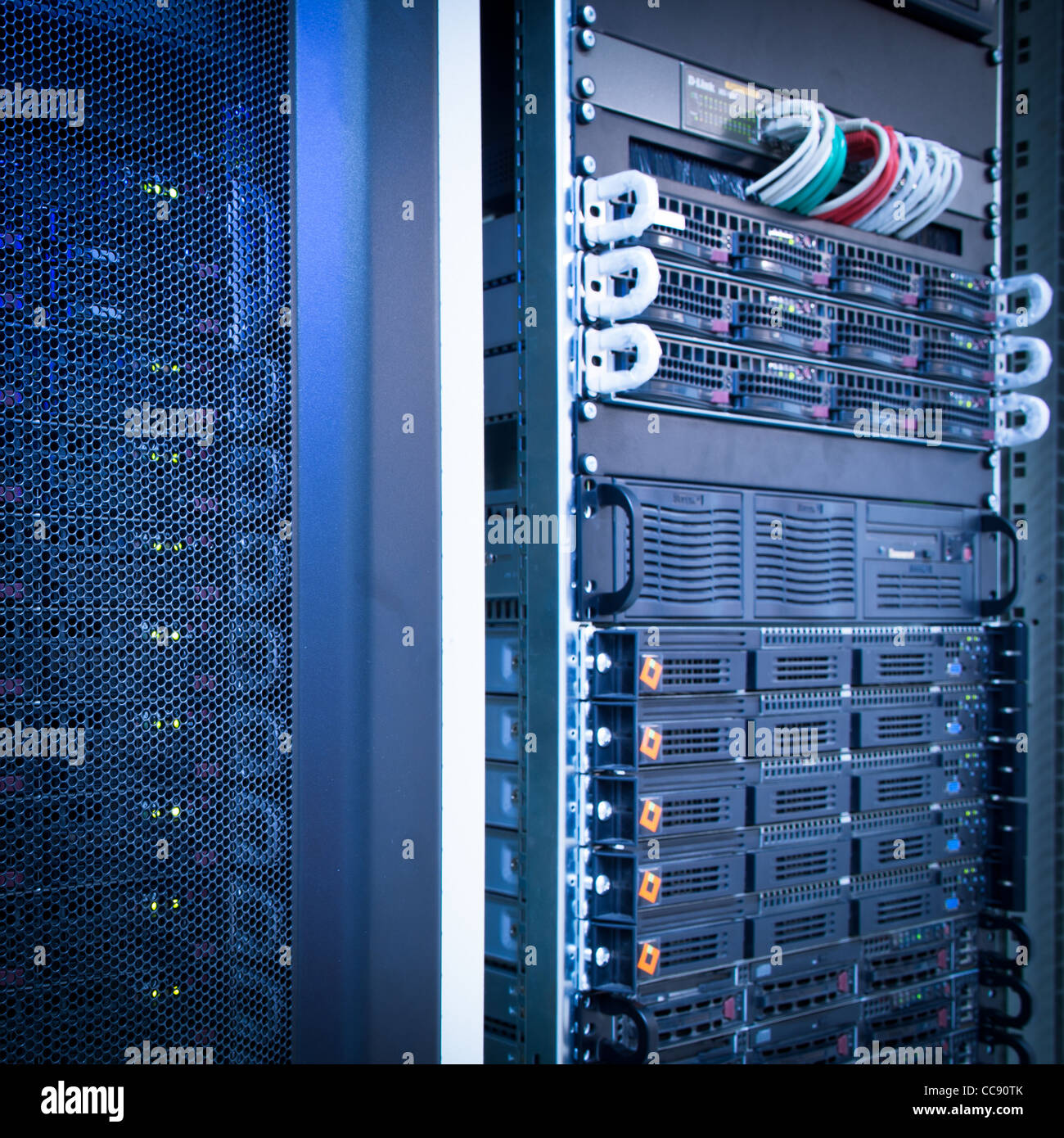Server rack cluster in a data center (shallow DOF; color toned image