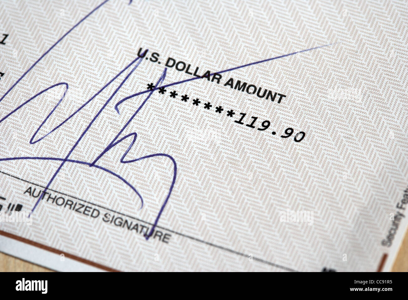 us dollar cheque issued as payment with dollar amount and signature Stock Photo